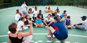Campers at La Chabotte playing basketball - Empowering Youth and Building Bridges