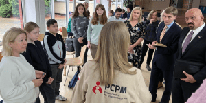 Ted Hart meeting with team members from PCPM