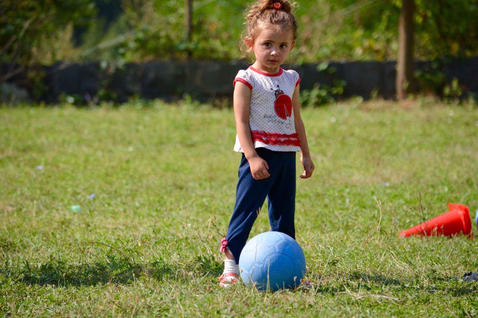 Young girl playing soccer
